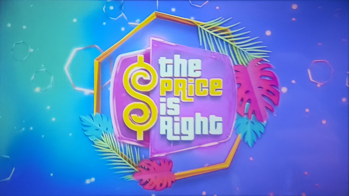 Pink and purple price is right logo for International Womens Day