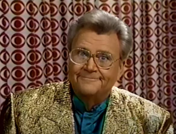 Rod is wearing a gold sequined jacket & seafoam-green silk collarless shirt
