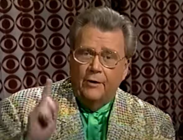 Rod is wearing a gold sequined jacket & lime green silk collarless shirt