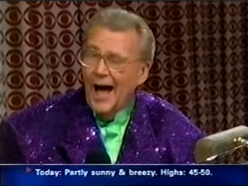 Rod is wearing a purple sequined jacket & lime-green collarless silk shirt