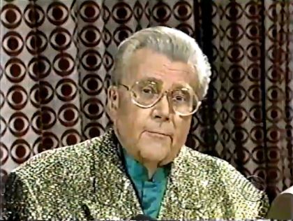 Rod is wearing a gold-sequined jacket & dark-green collarless silk shirt