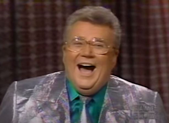 Rod is wearing a Silver Jacket & Tie with a Green Silk Shirt