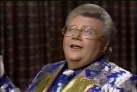 Rod is wearing a blue jacket with gold lapels & silver oak leaves, a matching necktie & blue silk shirt