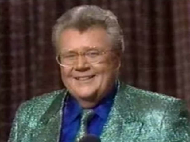 Rod is wearing a Green-sequined Jacket & Tie with a Blue Silk Shirt