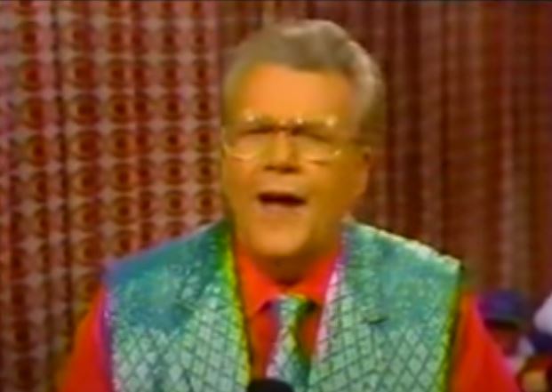 Rod is wearing a Quilted-look Green vest & tie with a Red shirt